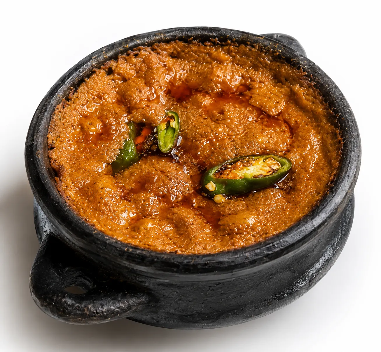 Shiro, pureed chickpea stew with spiced clarified butter, served with injera in Winnipeg